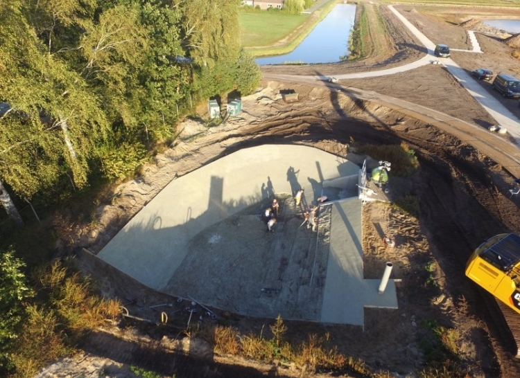 Aanbrengen beton uitstroom buffer